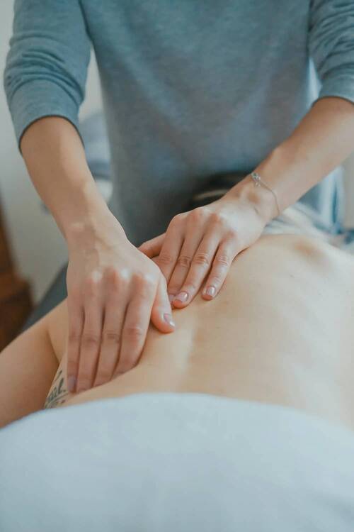 The picture shows a back massage.