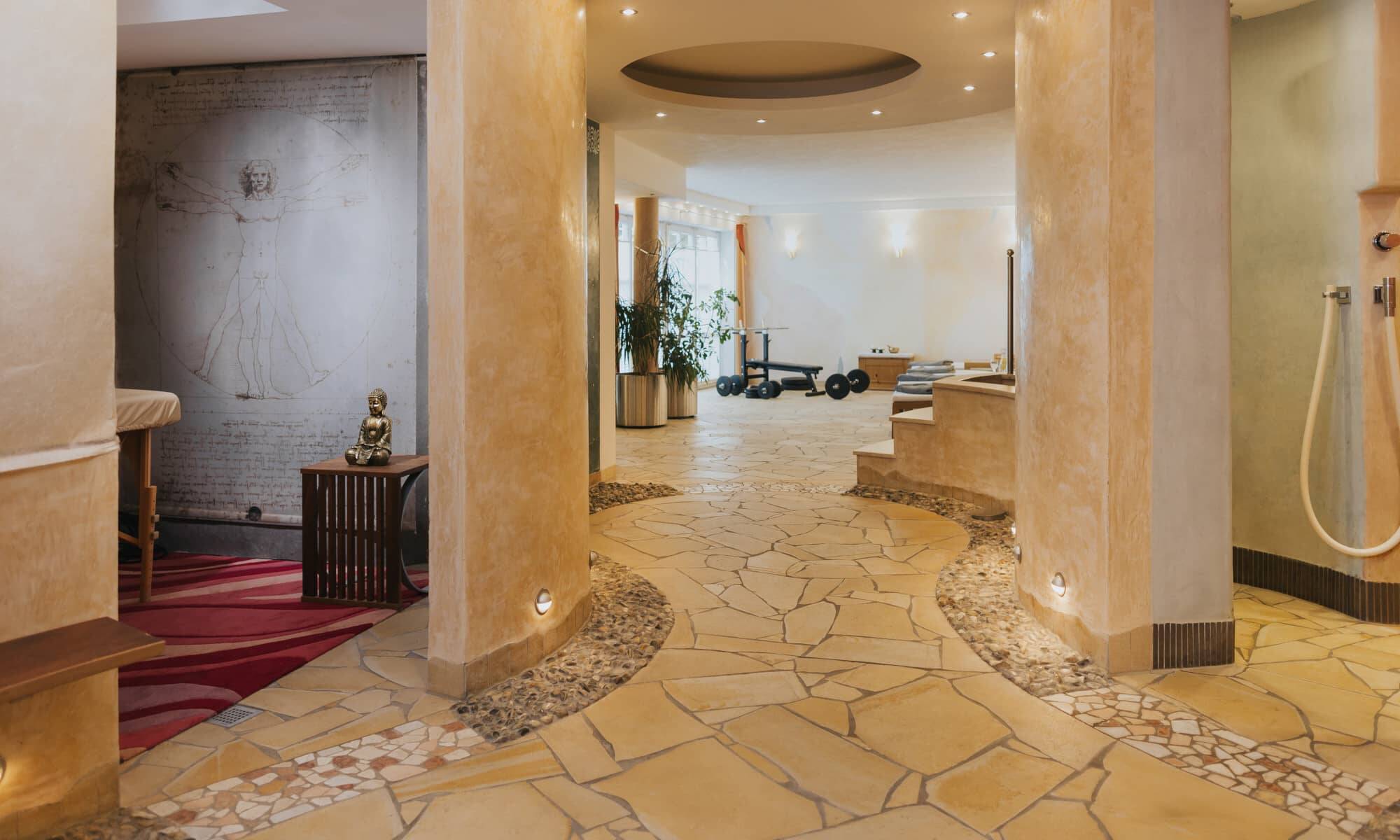 The Hollerhöfe wellness area with warm, muted colours and stone floors